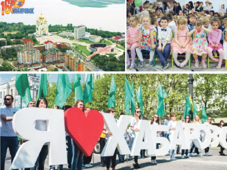 Над Амуром белым парусом высятся дома Хабаровска